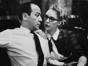 Broadway composer Frank Loesser and his wife and musical partner Lynn are shown, April 26, 1956 in New York. Their song "Baby, It's Cold Outside" was originally a song they performed for friends at their housewarming party. A new survey suggests most Canadians have warm feelings for the holiday song "Baby it's Cold Outside," despite controversy over its lyrics.