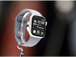 In this Sept. 12, 2018, file photo the new Apple Watch 4 is on display at the Steve Jobs Theater during an event to announce new products in Cupertino, Calif. The latest Apple Watch, for instance, has several features that will be useful to the elderly and less-active individuals. That includes built-in EKG sensors so you can share detailed heart readings with your doctor without visiting a clinic.