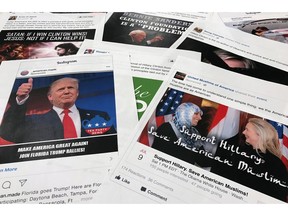 Some of the Facebook and Instagram ads linked to a Russian effort to disrupt the American political process and stir up tensions around divisive social issues, released by members of the U.S. House Intelligence committee, are photographed in Washington, on Wednesday, Nov. 1, 2017. A report compiled by private researchers and released by the Senate intelligence committee Monday says that "active and ongoing" Russian interference operations still exist on social media platforms, and that the Russian operation discovered after the 2016 presidential election was much broader than once thought.