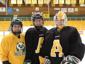 University of Alberta Pandas' Abby Benning, left to right, Cayle Dillon and Kirsten Chamberlin are seen in a recent handout photo. The women were returning to Edmonton from a game in Calgary about 1:30 a.m. on Nov. 24 when their chartered bus clipped a semi that was pulled over on the highway. They say their first thoughts were about the Broncos bus crash earlier this year and are adding their voices to calls for seatbelt use on team buses.