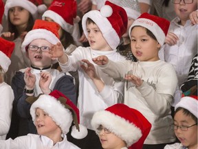 Children from St. Bernard School sing during the noon Festival of Carols at TCU Place on Dec. 7, 2016.