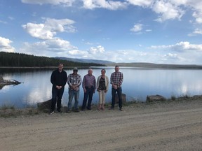 Members of the First Nations Major Projects Coalition (left to right) Niilo Edwards, executive director of the First Nations Major Projects Coalition, councillor Ted Jack, Cheslatta Carrier Nation, Jason Edworthy, BluEarth Renewables, Chief Corrina Leween, Cheslatta Carrier Nation, and Gareth McDonald, BluEarth Renewables, stand on top of the Kenney Dam in northwestern British Columbia in a handout photo. THE CANADIAN PRESS/HO