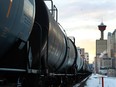In a carefully managed plan, the NDP government should use new rail cars to ship oil and curtail oil production, says columnist Ted Morton, former Alberta finance minister.