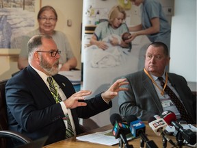 Saskatchewan Health Authority (SHA) CEO Scott Livingstone (left) and SHA board chairperson R.W. (Dick) Carter speak to members of the media in a board room at the Wascana Rehabilitation Centre regarding the progress on health system transformation on the one-year anniversary of the creation of the Saskatchewan Health Authority.