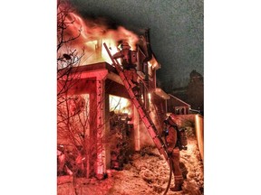 Firefighters with Melfort Fire and Rescue work to battle a house fire in the Village of Beatty on Christmas Eve. Uploaded Dec. 25, 2018. (Melfort Fire and Rescue) ORG XMIT: SUpe9MTeliw9D-Nn95SY