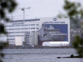 The Irving Shipbuilding facility is seen in Halifax on June 14, 2018. The $60-billion effort to build new warships for Canada's navy is facing another delay after a trade tribunal ordered the federal government to postpone awarding a final contract for the vessels' design. The federal government announced last month that U.S. defence giant Lockheed Martin beat out two rivals in the competition to design replacements for the navy's frigates and destroyers. Lockheed is now negotiating a final contract with the government and Halifax-based Irving Shipbuilding, which will build the ships.