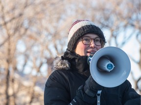 Shayna Stock of the Heritage Community Association speaks at a rally to save Maple Pool on 14th Avenue. Stock is on the speaker list for the pool and as part of a delegation calling for better funding for community associations.