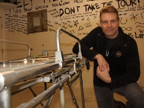 Shaun Hesse, the owner of Escape Manor in Saskatoon, next to a stretcher located in one of the establishment's escape rooms on Jan. 4, 2019 in Saskatoon. Hesse said the business is much more than escape rooms, as it also contains classic games like bocce ball alongside newer thrills like axe throwing.