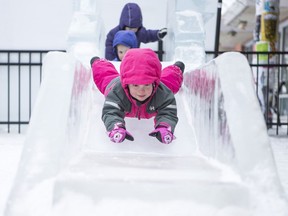 Seyla Kahovec slides down an ice slide at the farmers market during the WinterShines festival in Saskatoon,Sk on Thursday, January 31, 2019. Winter weather is expected to be felt across the province as snow is forecast through the weekend.