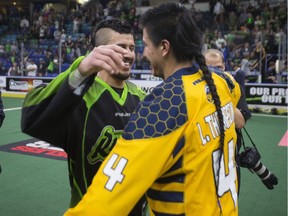 Saskatchewan Rush transition/defense Jeremy Thompson hugs his brother Lyle Thomspon of the Georgia Swarm after a 15-14 win for the Swarm during the championship game at SaskTel Centre in Saskatoon, SK on Saturday, June 10, 2017.