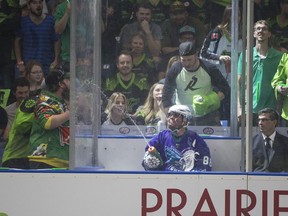 Rochester's Cody Jamieson directs a spray of water from the penalty box at a heckling Rush fan, during last season's NLL championship final.