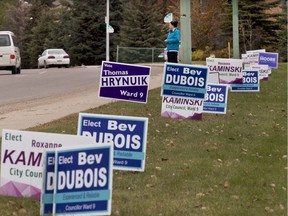 A Saskatoon city hall report says issues remain with the scheduling of the 2020 provincial and municipal elections. Here, signs remain a day after the Oct. 26, 2016 municipal election.