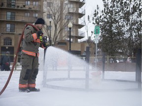 Saskatoon Fire Department unloads water to the construction of Crokicurl, a combination of two Canadian pastimes, curling and crokinole. The Broadway Business Improvement District is spearheading the rink outside the Broadway Roastery for the second year in a row. It officially opens during Interruption from Jan 24-26. The crokicurl rink will stay in place through Family Day in February.  in Saskatoon,Sk on Sunday, January 20, 2019.