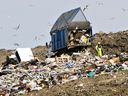 Garbage is unloaded at the Saskatoon landfill in this June 2011 photo.