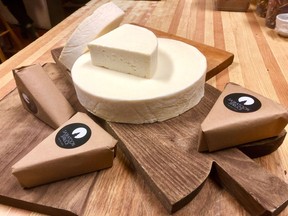To meet Canadian food safety regulations, Kevin Petty ages his raw milk cheese for at least 60 days on spruce boards cut from trees in Northern Saskatchewan.