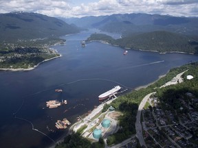 A aerial view of Kinder Morgan's Trans Mountain marine terminal, in Burnaby, B.C., is shown on Tuesday, May 29, 2018. First Nations that produce oil and gas will hear presentations Wednesday at the Indigenous Energy Summit on how they might make investments in major projects including the Trans Mountain pipeline. Steven Saddleback of the Indian Resource Council says an afternoon session will feature presentations on four different financing models that could be followed to allow ownership of major projects including but not limited to the oil pipeline from Edmonton to Burnaby, B.C.