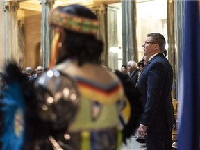Premier Scott Moe stands during the Apology to Sixties Scoop Survivors at the Legislative Building in Regina on Monday, January 7, 2019.