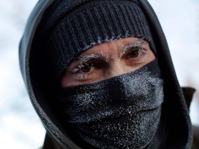 Frank Lettiere's eyebrows and eye lashes are frozen after walking along Lake Michigan's ice covered shoreline as temperatures dropped to -20 degrees F (-29C) on January 30, 2019 in Chicago, Illinois.