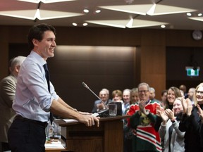 Prime Minister Justin Trudeau addresses a meeting with caucus on Parliament Hill in Ottawa on Sunday, January 20, 2019.