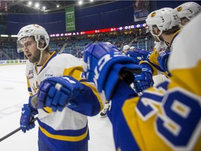 Saskatoon Blades players celebrate a goal during a recent game in Saskatoon.