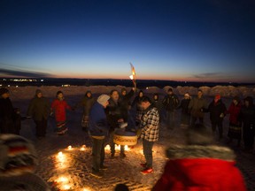 Friends, family and supporters of Colten Boushie hold a candlelight vigil at Chapel Gallery in North Battleford on Feb. 9, 2019.