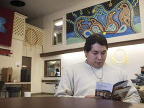 Jonathon Bird sits in the lobby of the Indian & Metis Friendship Centre. An information session on the Sixties Scoop settlement claims process is underway in Saskatoon, SK on Tuesday, February 12, 2019.