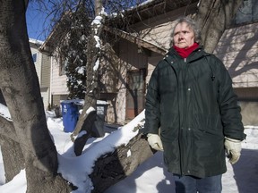 Rita Alie-Kirkpatrick in front of her home in February. She was evicted over unpaid property taxes last month.