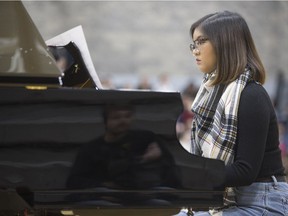 Andrea Desalisa plays the piano during a event where the family of J.P. Haughey are donating a baby grand piano to Bethlehem High School in Saskatoon, Sk on Thursday, February 28, 2019.