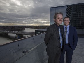 Gregory Burke, left, Remai Modern executive director and CEO and Scott Verity, chair of the Remai Modern board, pose on the roof top patio at the Remai Modern in Saskatoon, SK on Tuesday, October 16, 2018.