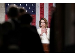 House Speaker Nancy Pelosi, claps on the House floor as guests are announced as they arrive prior to President Donald Trump arriving and delivering his State of the Union address to a joint session of Congress on Capitol Hill in Washington, Tuesday, Feb. 5, 2019.