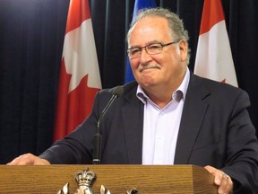 Alberta Government House Leader Brian Mason speaks during a press conference in Edmonton on July 4, 2018. Alberta Transportation Minister Brian Mason says it's clear photo radar is being used as a cash cow by municipalities, and he is implementing changes he thinks will fix it. Mason says the plan is to make the system more transparent, and to stop practises geared to raking in money rather than keeping roads safe.