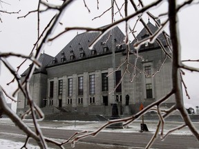 Ice coats tree branches outside of the Supreme Court of Canada in Ottawa on December 10, 2012. The Supreme Court of Canada says it won't hear the case of two Calgary Muslim students who were barred from praying at a non-denominational private school.