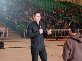 Retired NHLer Jordin Tootoo answers a question from a student at the Walking Together Symposium hosted by the Saskatoon Tribal Council at the PAC on Feb. 7, 2019.