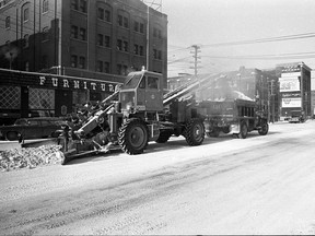 A photo of city snow clearing crews hard at work, from Feb. 14, 1973. (Provincial Archives of Saskatchewan StarPhoenix Collection S-SP-A7873-3)
