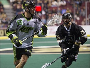 Saskatchewan's Jeff Shattler is pursued by Vancouver's Dallas Wade during an NLL game earlier this season.