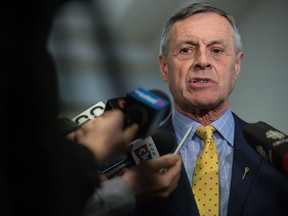 Saskatchewan Justice minister Don Morgan speaks to members of the media at the Saskatchewan Legislative Building regarding the upcoming court challenge the province has made against the federal government's carbon tax.