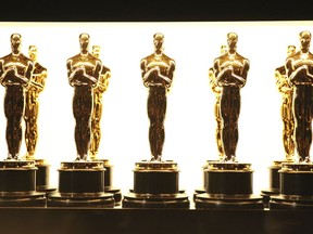 FILE - In this Feb. 26, 2017 file photo, Oscar statuettes appear backstage at the Oscars in Los Angeles. Responding to widespread backlash to the fact that four Oscars will be presented during commercial breaks at the 91st Academy Awards, the film academy has issued a statement reiterating that all Academy Award winners will still be included in the broadcast on Feb. 24, just not all live.
