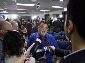 In this Friday, Feb. 22, 2019 photo, former Chicago Sun-Times reporter Jim DeRogatis talks to reporters after a news conference by Cook County State's Attorney Kim Foxx announcing charges against R. Kelly, the R&B star, with with 10 counts of aggravated sexual abuse involving multiple victims in Chicago.