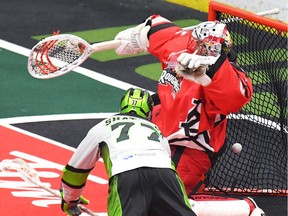 Jeff Shattler (77) notches one of his three goals but it was not enough for the Saskatchewan Rush, who dropped a 17-12 decision Saturday to the Calgary Roughnecks in National Lacrosse League action Feb. 9 at SaskTel Centre. (Wayne Shiels, Saskatchewan Rush)