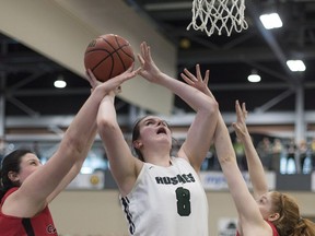 Saskatchewan Huskies centre Kyla Shand (8) goes up for a basket on the Carleton Ravens during the U Sports Women's Basketball final at University of Regina in Regina, Saskatchewan on Sunday March 11, 2018.