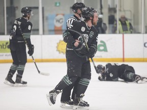 U of S Huskies defender Jesse Forsberg gets carried off the ice during Game 2 of the Canada West men's hockey final at Merlis Belsher Place in Saskatoon on Saturday, March 2, 2019.