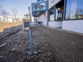 Ice and dirt cover the sidewalk outside of the Broadway Theatre and Calories after a water main break on Broadway Avenue in Saskatoon, SK. on Tuesday, March 5, 2019.