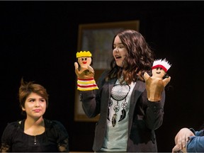 SASKATOON,SK--MARCH 5/2019--0306 Art Native Studies 101  – Kaylynn Bear, centre, gives a puppet show to students played by Tyra Kay, left, and Aaron-Marie Nepoose in Dakota Ray Hebert's show Native Studies 101  in Saskatoon, SK. on Tuesday, March 5, 2019. (MATT SMITH/THE STAR PHOENIX)