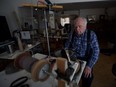 91-year-old Bob Rutherford makes socks and toques to be donated to those in need through his program Socks by Bob out of Saskatoon. Since beginning in 2010, they've made nearly 16,000 items to be donated. Photo taken March 7, 2019.