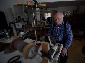 91-year-old Bob Rutherford makes socks and toques to be donated to those in need through his program Socks by Bob out of Saskatoon. Since beginning in 2010, they've made nearly 16,000 items to be donated. Photo taken March 7, 2019.