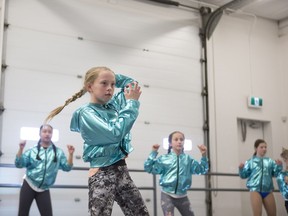 SASKATOON,SK--March 09 0309-NEWS-POP KIDS- Kaylee Butler (R) practices to preform alongside the Mini Pop Kids at at Ignite Danceworks in Saskatoon, Sk on Saturday, March 9, 2019.