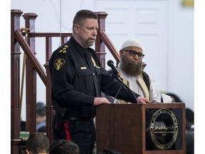 Chief of Police Troy Cooper and Imam Illyas speak to members of Saskatoon's muslim community at the Islamic Association of Saskatchewan after attacks on two mosques in Christchurch, New Zealand in Saskatoon, SK. on Friday, March 15, 2019.