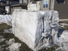 Warm weather has taken its toll on a giant snow sculpture of a toaster in the 200 block of Addison Road in Saskatoon, Saskatchewan on Tuesday, March 19, 2019.