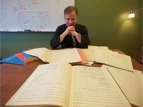 Johannes Dyring, grandson of acclaimed music editor Heinz Moehn, shows off his grandfather's original manuscripts in his office at Innovation Enterprise in Saskatoon on March 13, 2019. Moehn's concerto, written in the late 1930s, will premiere with the Saskatoon Symphony Orchestra on March 23.