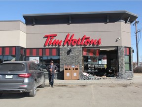 Residents continued to line up for coffee and snacks as Tim Hortons staff picked up pieces of glass and debris that were spread all over the restaurant's eating area after the vehicle went through the front window at roughly 2 p.m. on March 21, 2019. Police say initial investigation indicates the driver of the vehicle may have accidentally hit the gas, as opposed to the brake, causing her to go through the wall.